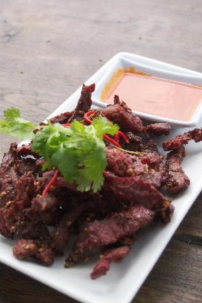 Dried hot beer beef with sriacha dipping sauce