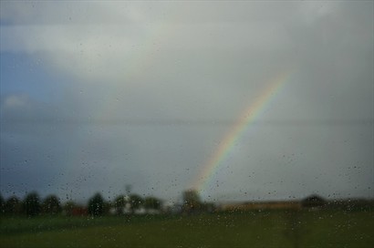 Double Rainbow after rain (Taken from moving coach)