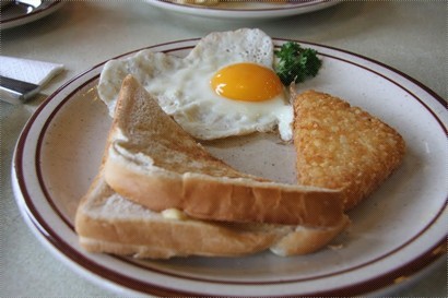 Eggs served with toast & hash brown